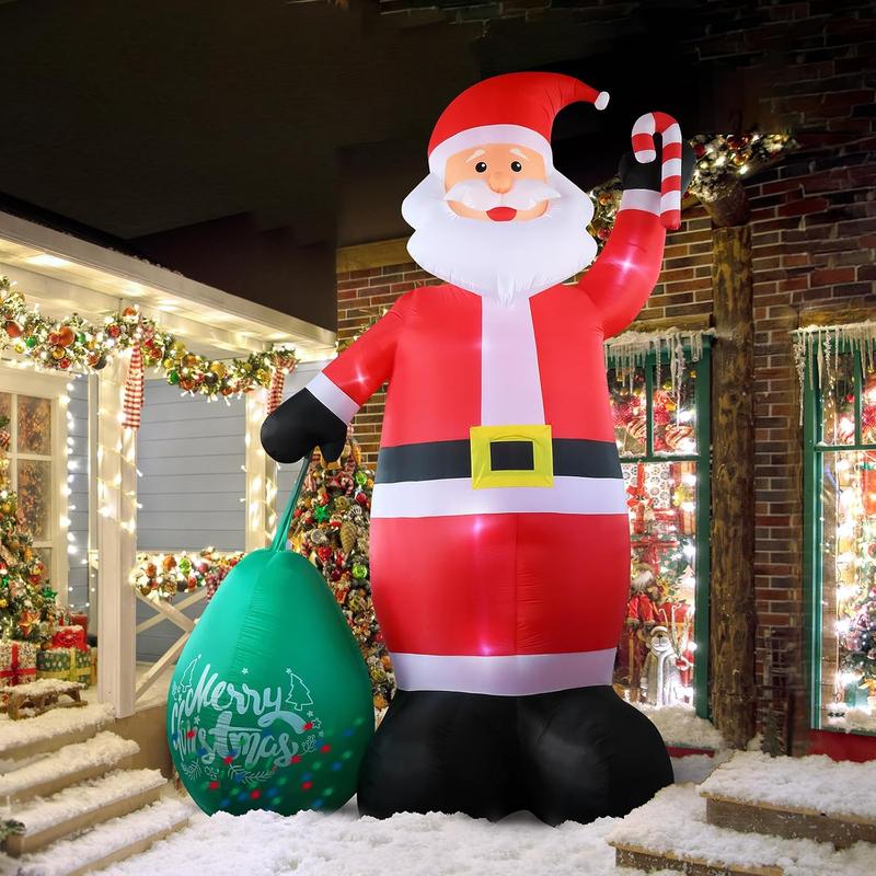 Lighted inflatable Santa at night in front of a house